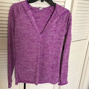 Under Armour long sleeve hooded shirt.